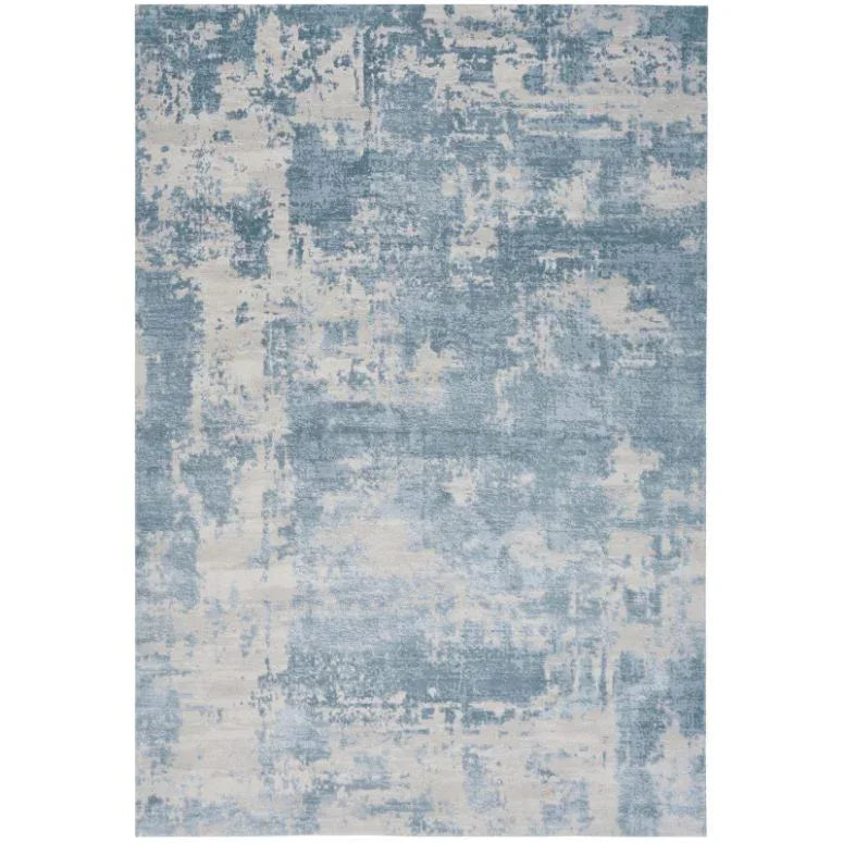 Blue and cream abstract area rug with modern textured pattern