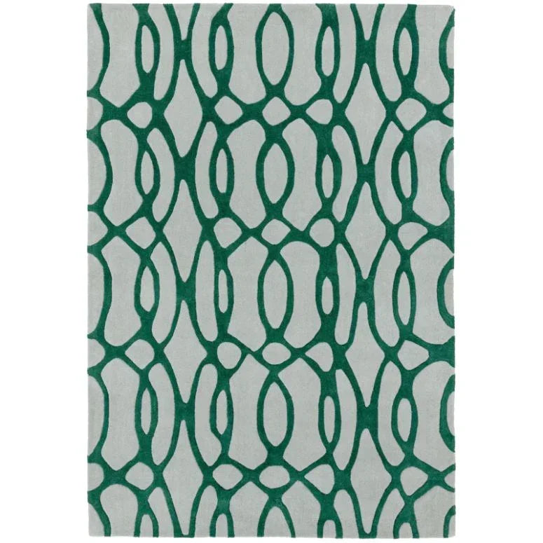 Modern area rug with green geometric pattern on a light background