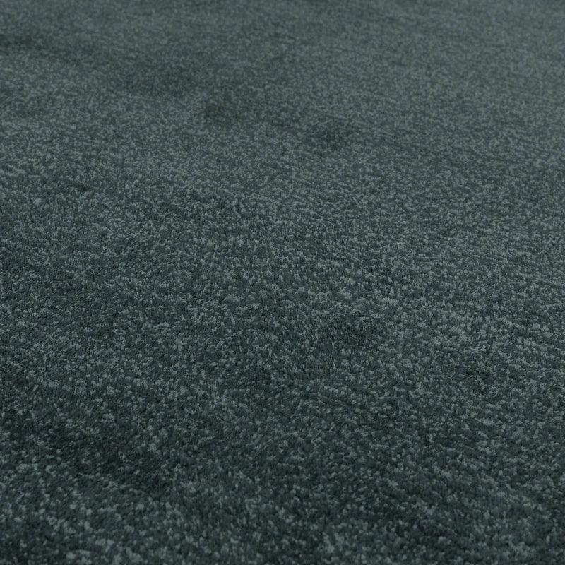 Close up of dark grey carpet texture with soft pile