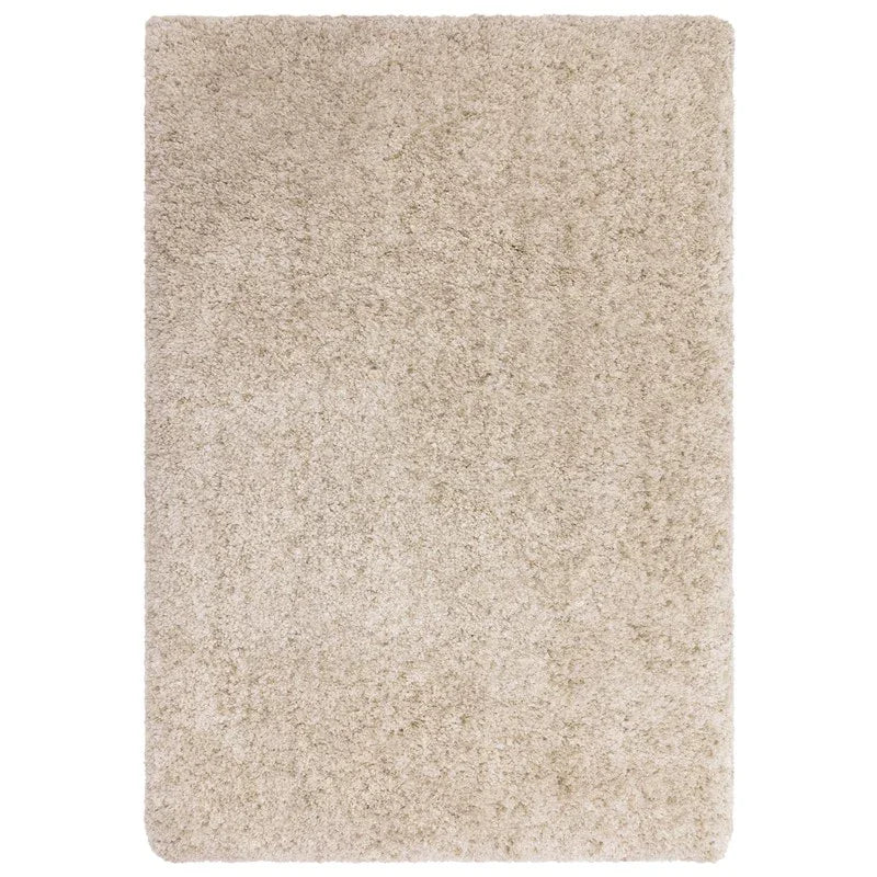Beige shaggy area rug with thick pile and rectangular shape