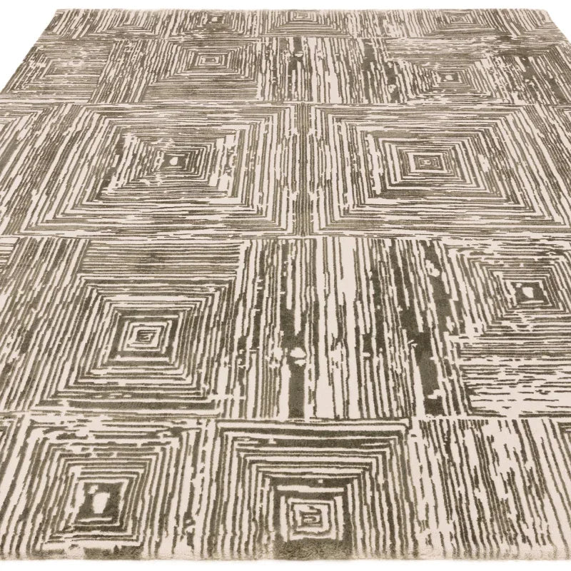 Modern geometric area rug with grey and ivory concentric square pattern
