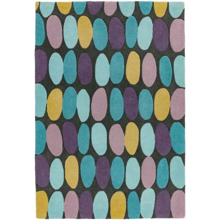 Modern multicolored patterned rug with oval shapes in blue, yellow, purple on dark background