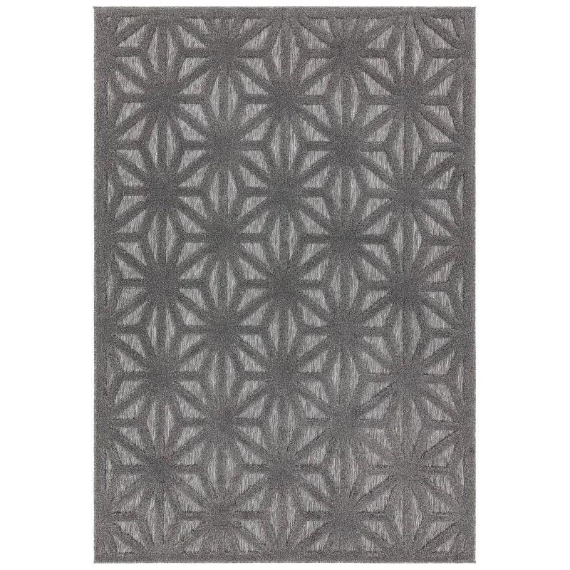 Grey geometric patterned rug with textured diamond and star shapes
