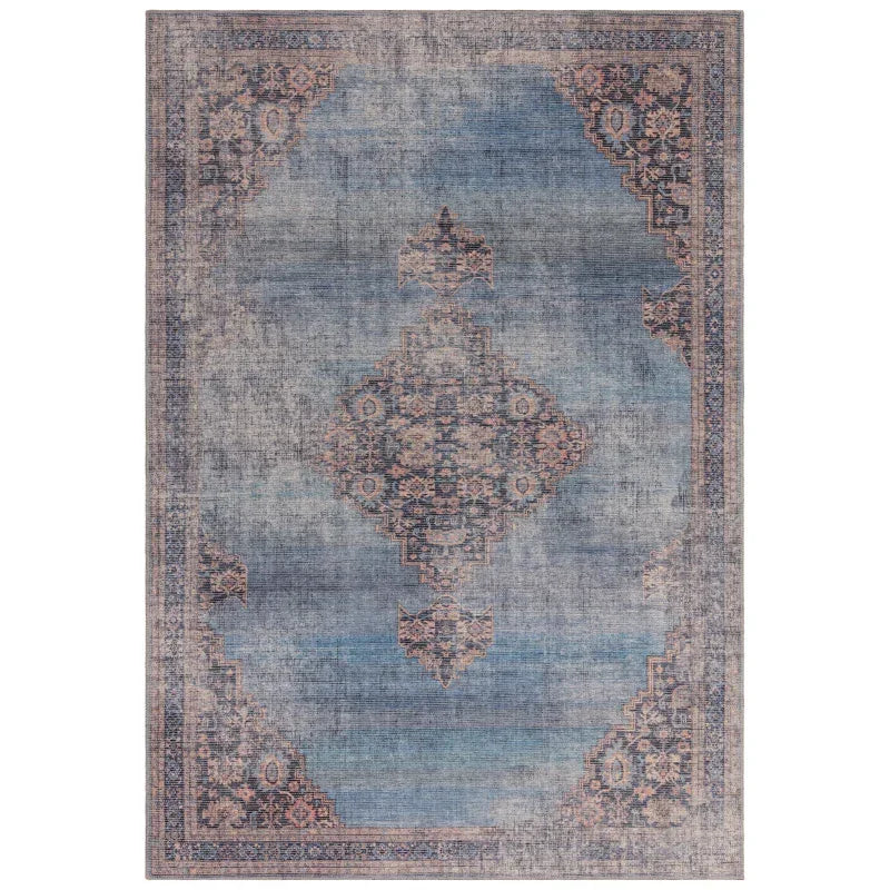 Blue vintage Persian rug with distressed pattern and ornate medallion design