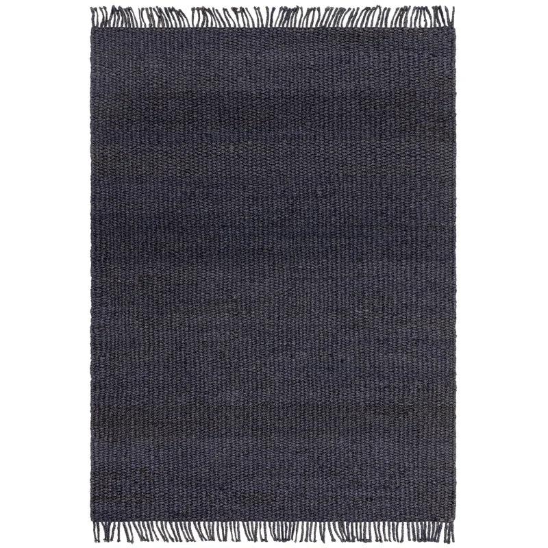Dark navy woven rug with fringe edges, rectangular design, textured floor decor