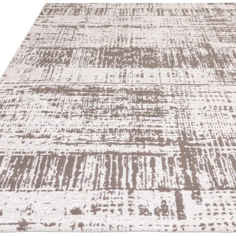 beige and cream area rug with abstract modern pattern