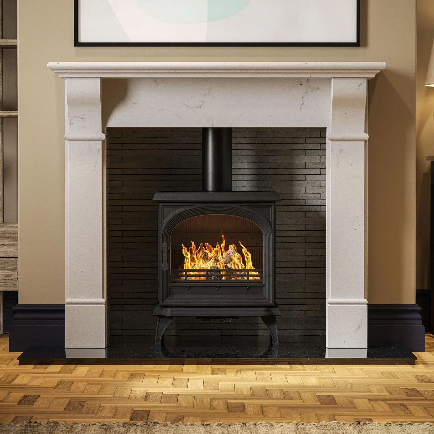 Modern black wood burning stove with flame inside set in stone fireplace surround