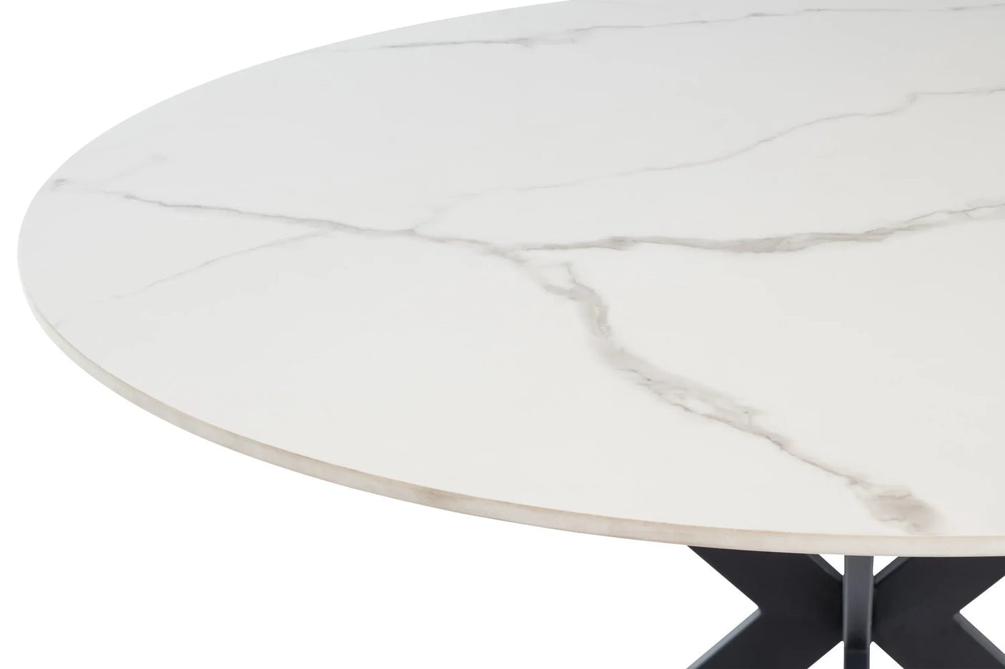 Close-up of round marble dining table with black metal base