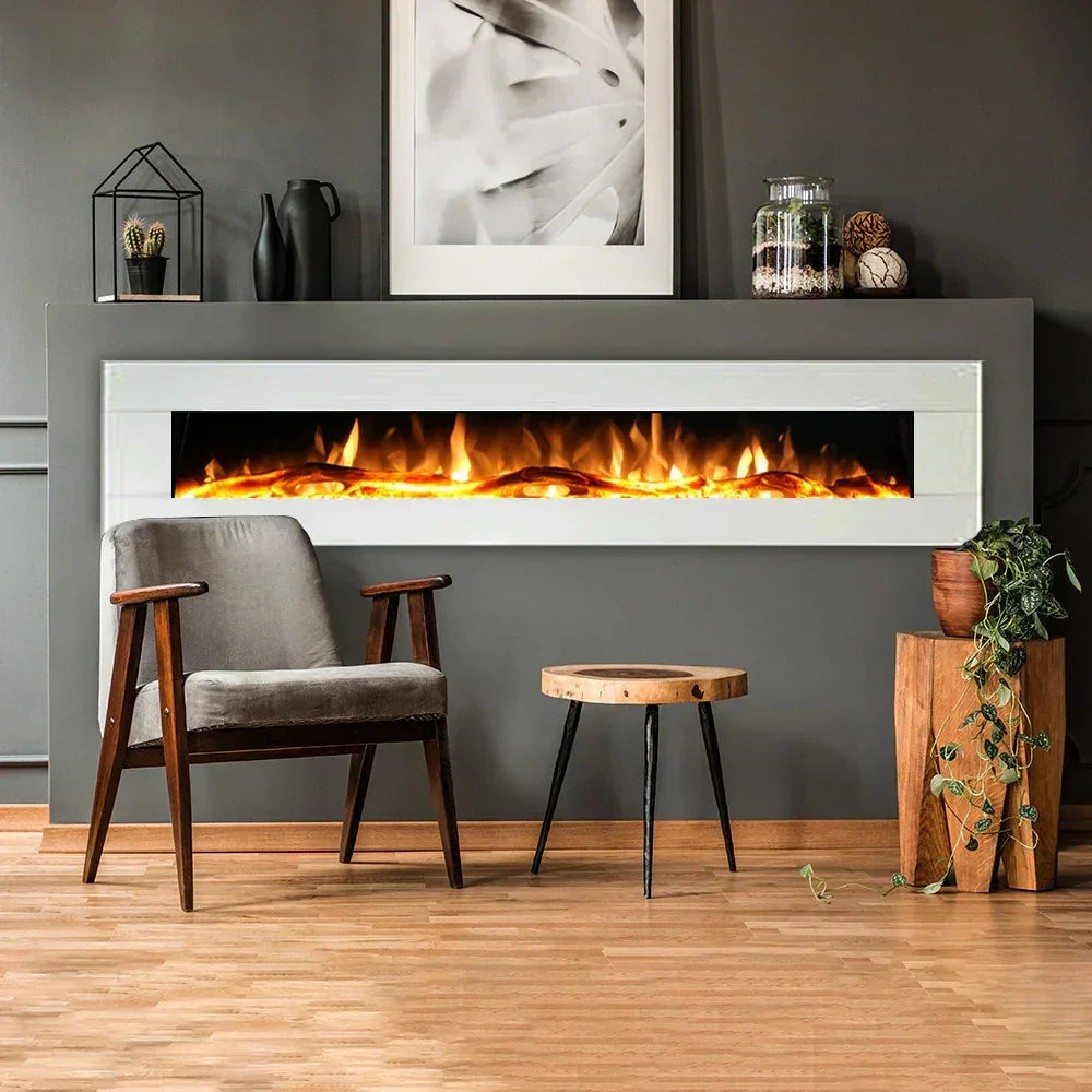 Wall mounted electric fire with white frame in modern living room setting with armchair