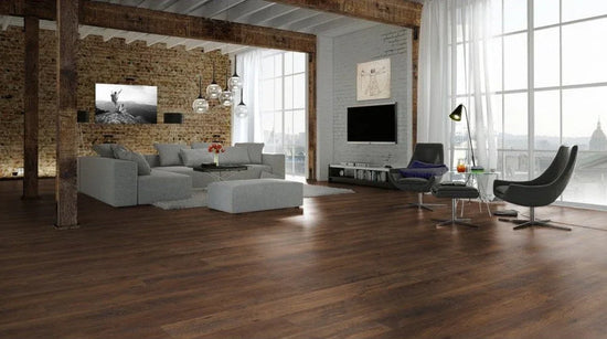 Buy engineered hardwood flooring online, modern loft with dark wood floors and large windows