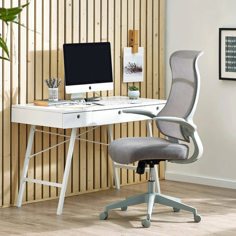 Grey archer office chair with mesh back on wheels at modern white desk workspace