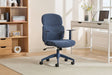 Blue office chair with ergonomic backrest and armrests on castors in a modern home office
