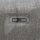 Closeup of grey swivel chair fabric with built-in USB and power control panel