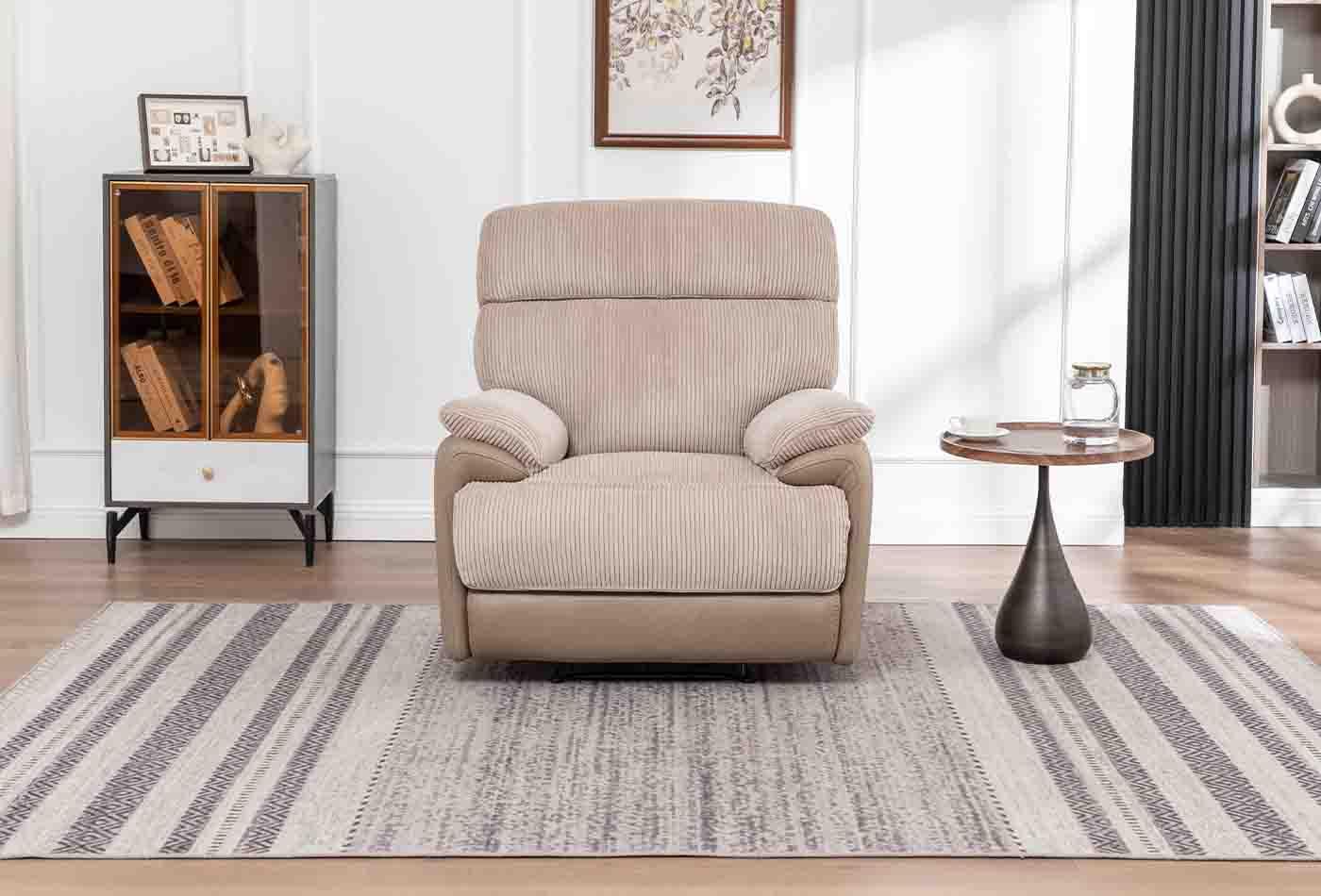 Beige corduroy Arlington 1 seater armchair on striped rug in modern living room