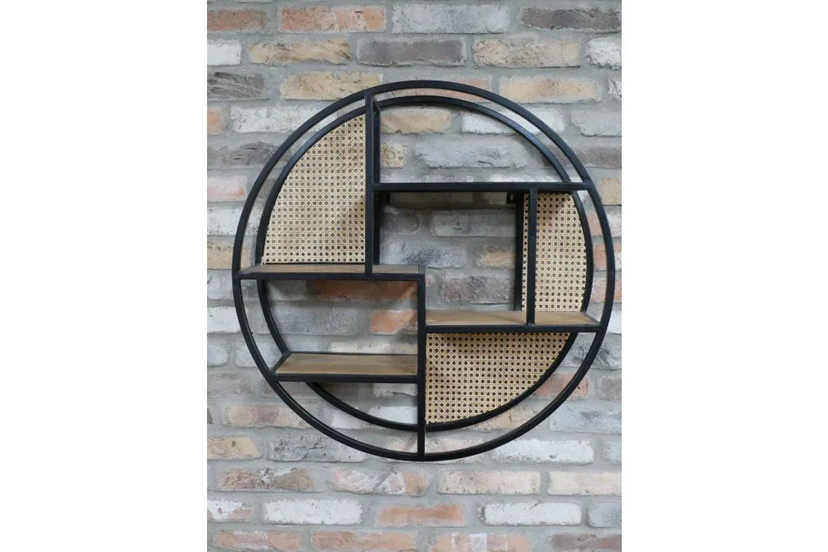 Round wall shelf with black metal frame, wood shelves, and rattan panels on brick wall