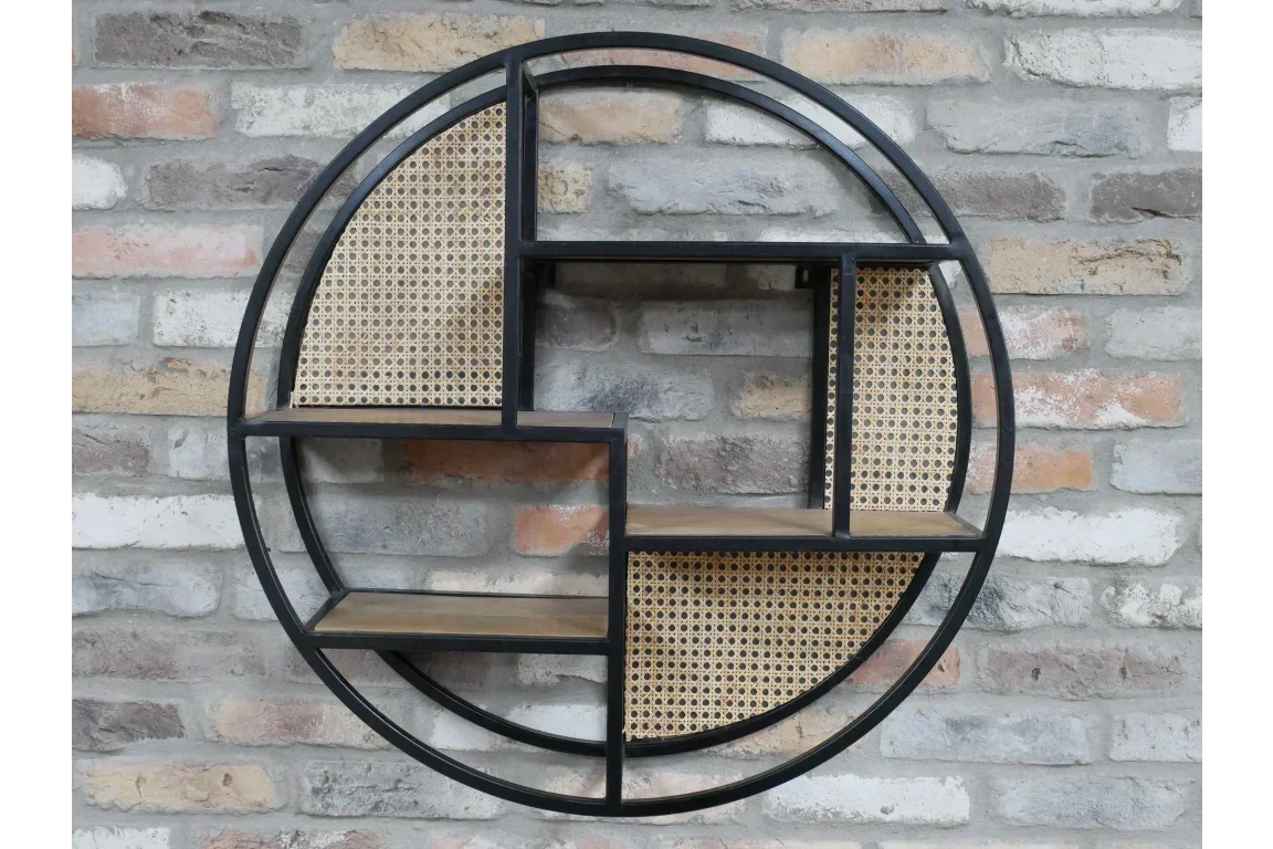 Round metal wall shelf with wood and rattan panels on exposed brick wall