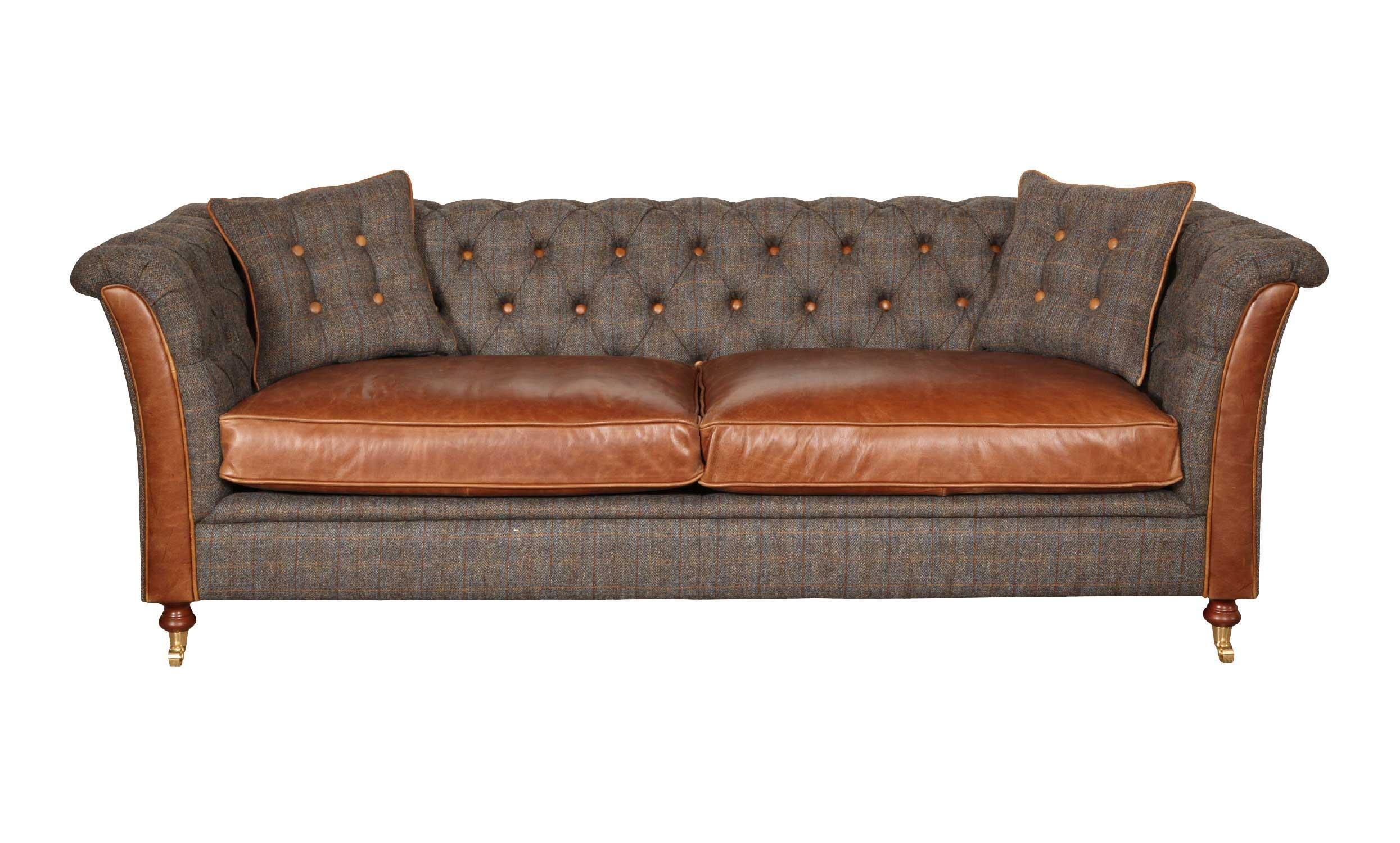 Brown leather and tweed sofa with button tufted back and two matching cushions