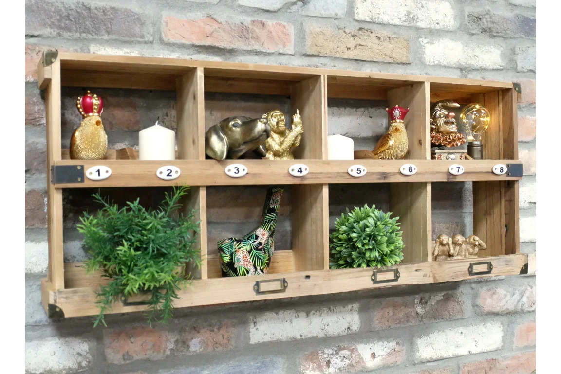 Rustic wooden wall shelf with cubby storage, decorative ornaments and artificial plants