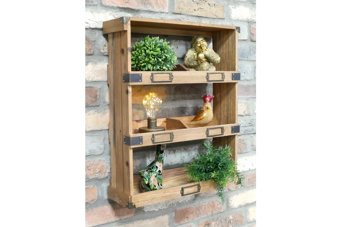 Rustic wooden wall shelf with metal label holders, decorated with plants and ornaments