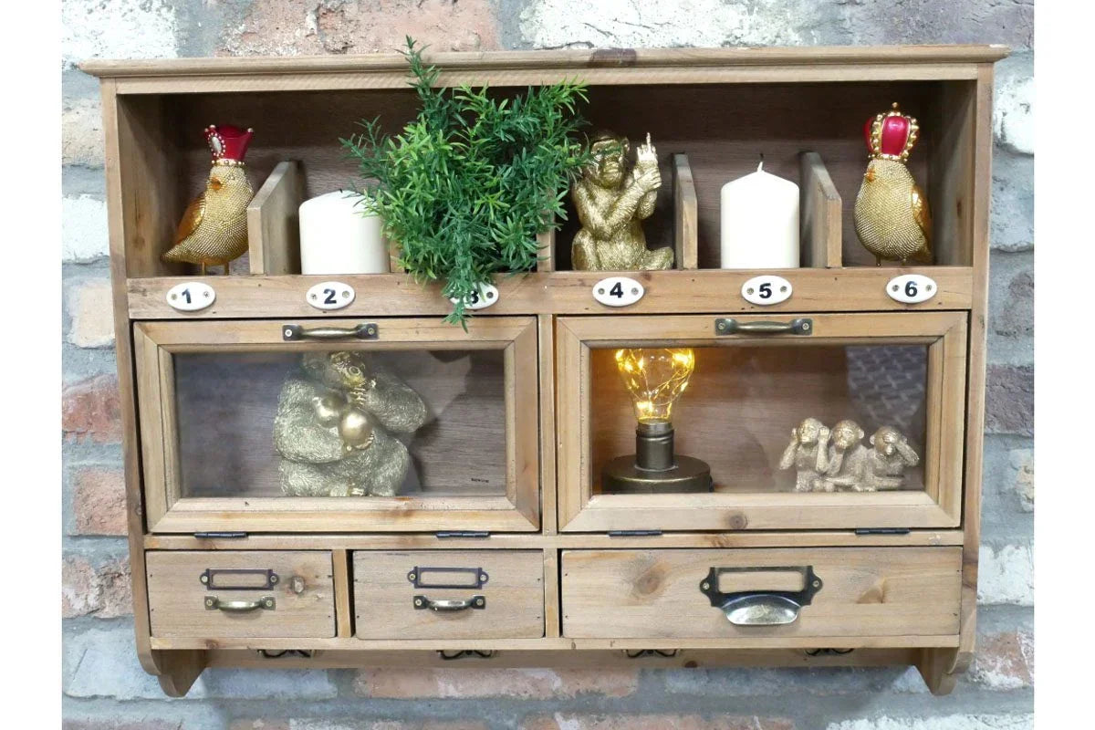 Wall-mounted wooden storage unit with numbered cubbies, gold ornaments, and decorative lamp