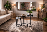 Set of 3 round side tables with black metal frames and mosaic tile tops, displayed in a cozy living room.