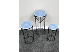 Set of 3 round side tables with blue patterned ceramic tops and black metal legs on gray carpet.