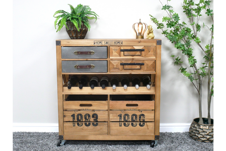Wooden wine cabinet with metal and wood drawers, open bottle rack, and numbered crate compartments, shown in a room setting.