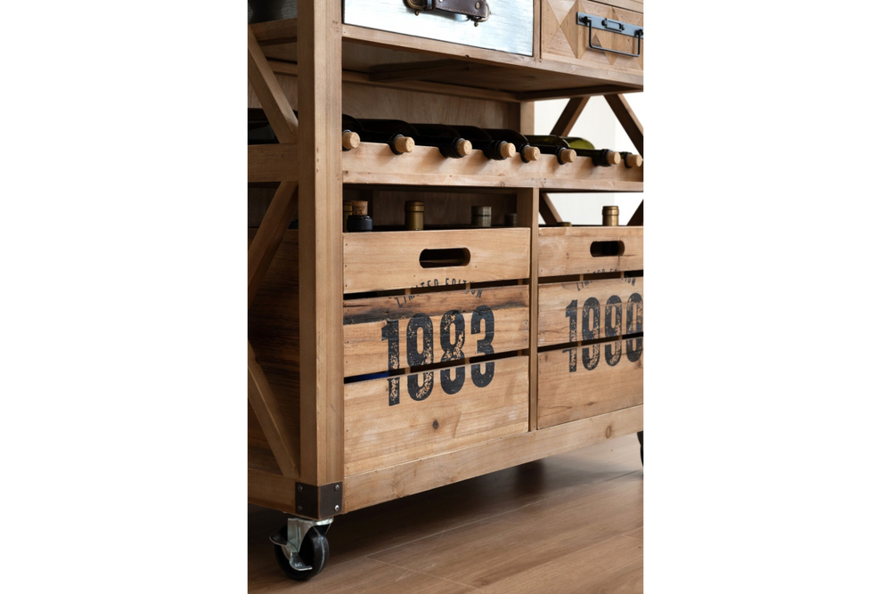 Light wood wine cabinet with storage crates marked "1983," horizontal bottle racks, and caster wheels, side angle view.