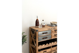 Wooden wine cabinet with metal drawer fronts, leather handles, wine bottle storage, top view with bottles and decor, angled