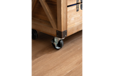 Close-up angled view of the light brown wooden wine cabinet corner with black caster wheel on wooden floor.