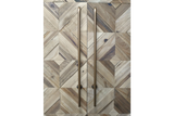 Wine cabinet with geometric patterned wood doors in natural tones and tall bronze handles, front view.