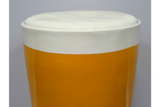 Round Lager Side Table in glossy amber and cream finish, top-down close-up view showing smooth surface detail.