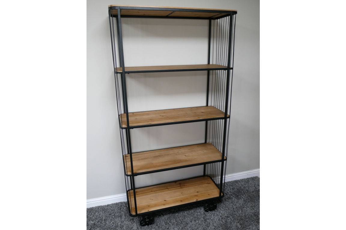 Tall shelving unit with five wooden shelves, black metal frame, and wheels on a grey carpeted floor.