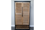 Tall wooden shutter bar cabinet with natural wood louvered doors, black frame, and built-in wine storage compartments.