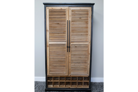 Tall wooden shutter bar cabinet with natural wood louvered doors, black frame, and built-in wine storage compartments.