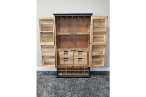 Wooden shutter bar cabinet with louvered doors open, four small drawers, wine rack base, natural and black finish, front view