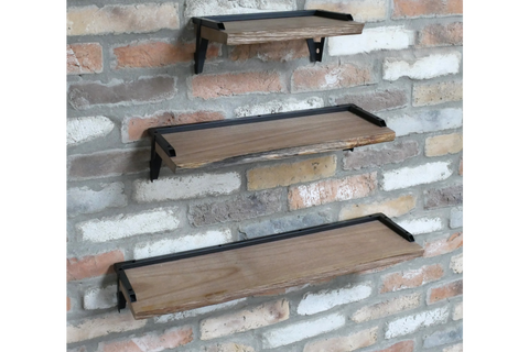 Set of 3 rectangular wooden wall shelves with black metal brackets, mounted on a textured brick wall, side angled view.