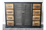 Shutter Sideboard with black frame, natural wood drawers, louvered doors, front view on gray carpet background