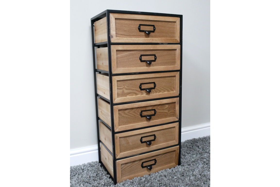 Tall industrial drawer cabinet with six natural wood drawers and black metal frame, angled view on gray carpet.