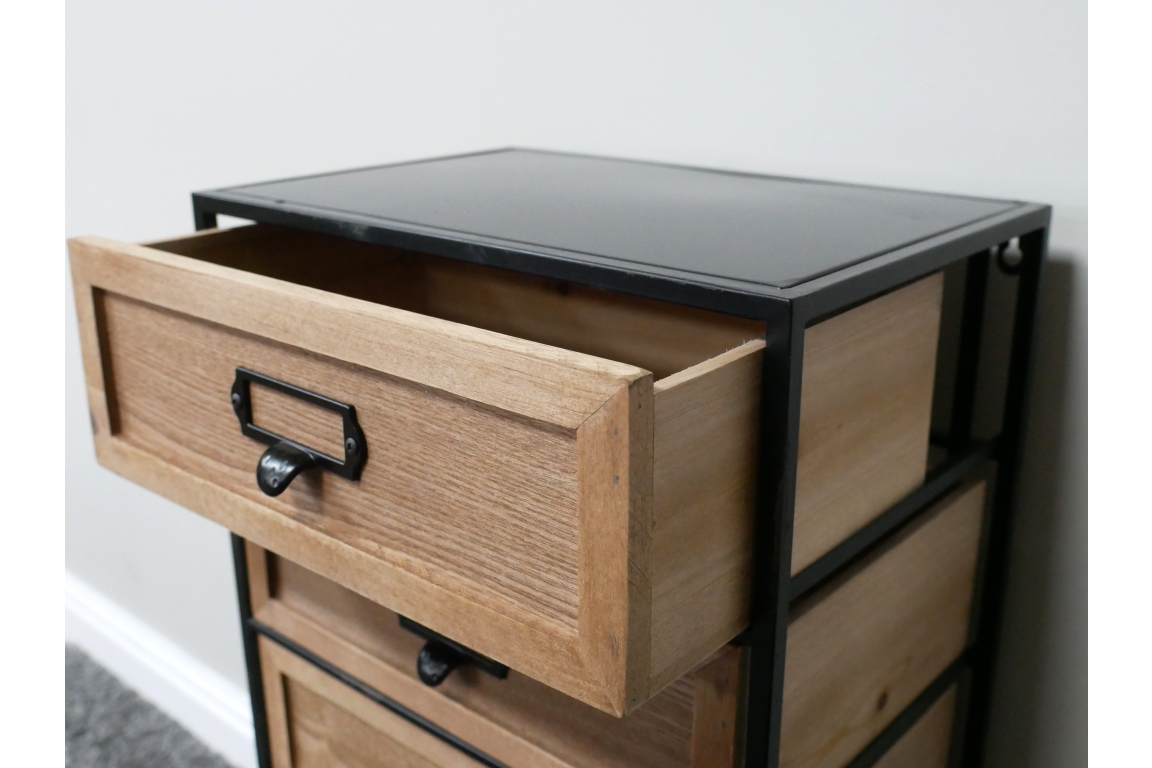 Industrial drawer cabinet with natural wood drawers and black metal frame, angled view in indoor setting.