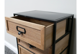 Industrial drawer cabinet with natural wood drawers and black metal frame, angled view in indoor setting.