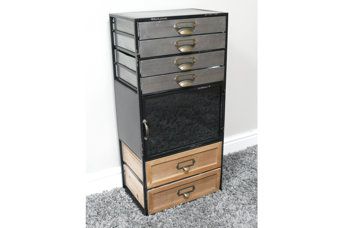 Tall industrial drawer cabinet with mixed wood and metal drawers, black metal frame, angled view on carpeted floor.