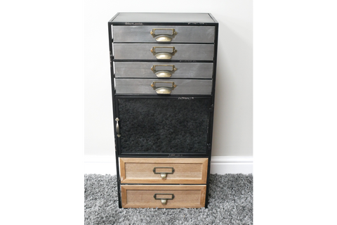 Tall industrial drawer cabinet with metal top drawers, a central black metal door, and two wooden bottom drawers on gray
