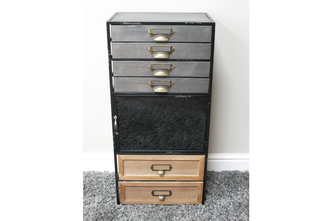 Tall industrial drawer cabinet with metal top drawers, a central black metal door, and two wooden bottom drawers on gray