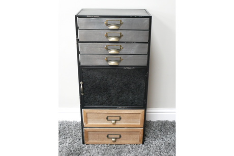 Tall industrial drawer cabinet with metal top drawers, a central black metal door, and two wooden bottom drawers on gray
