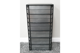 Tall industrial drawer cabinet with gray wooden panels and black metal frame, standing on a gray carpet.
