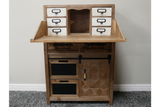 Rustic wooden cabinet with six white drawers on top, two chalkboard panels, and a geometric wooden door below, front view.