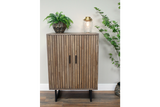 Wooden 2 door slatted cabinet in natural finish with black handles and legs, shown from front in indoor setting.