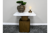 Square side table with white marble top and bronze base, shown with small potted plant and decorative light bulb on top.