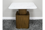 Square side table with white marble top and bronze metal base on gray shag carpet against white wall.